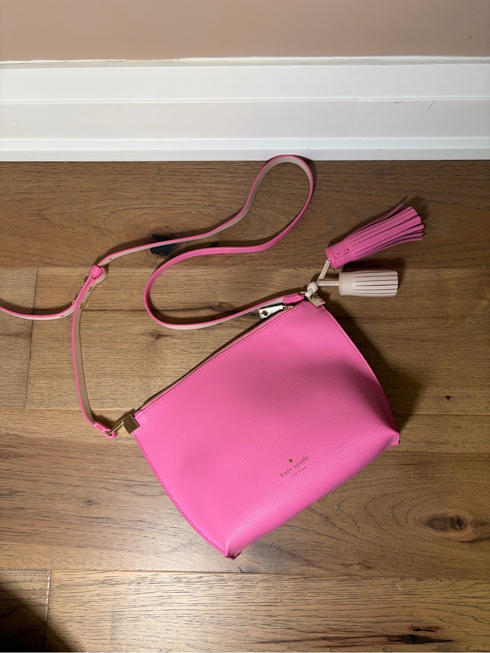 kate spade Bright Pink Leather Crossbody with Tassel Charm